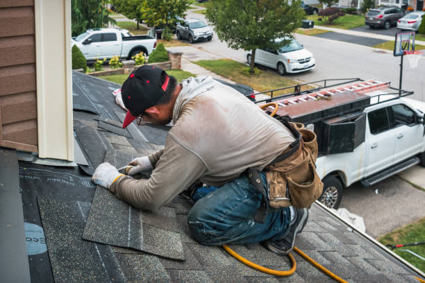 Professional Gutter Installation technician working in Freeland, MI